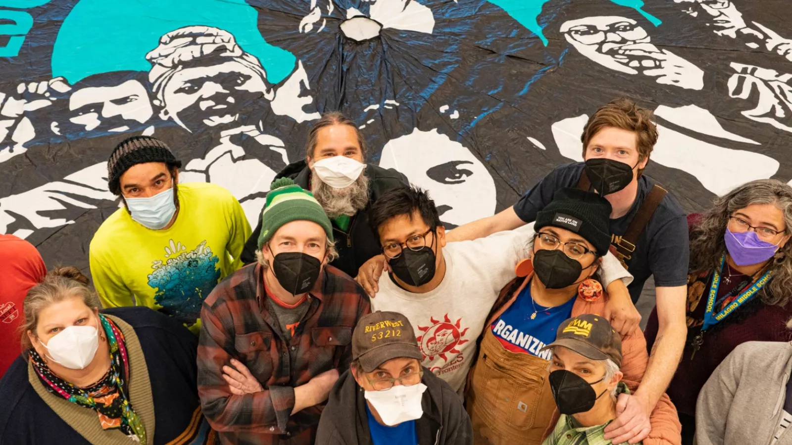 NEA New Mexico members posing with Education for Liberation sign